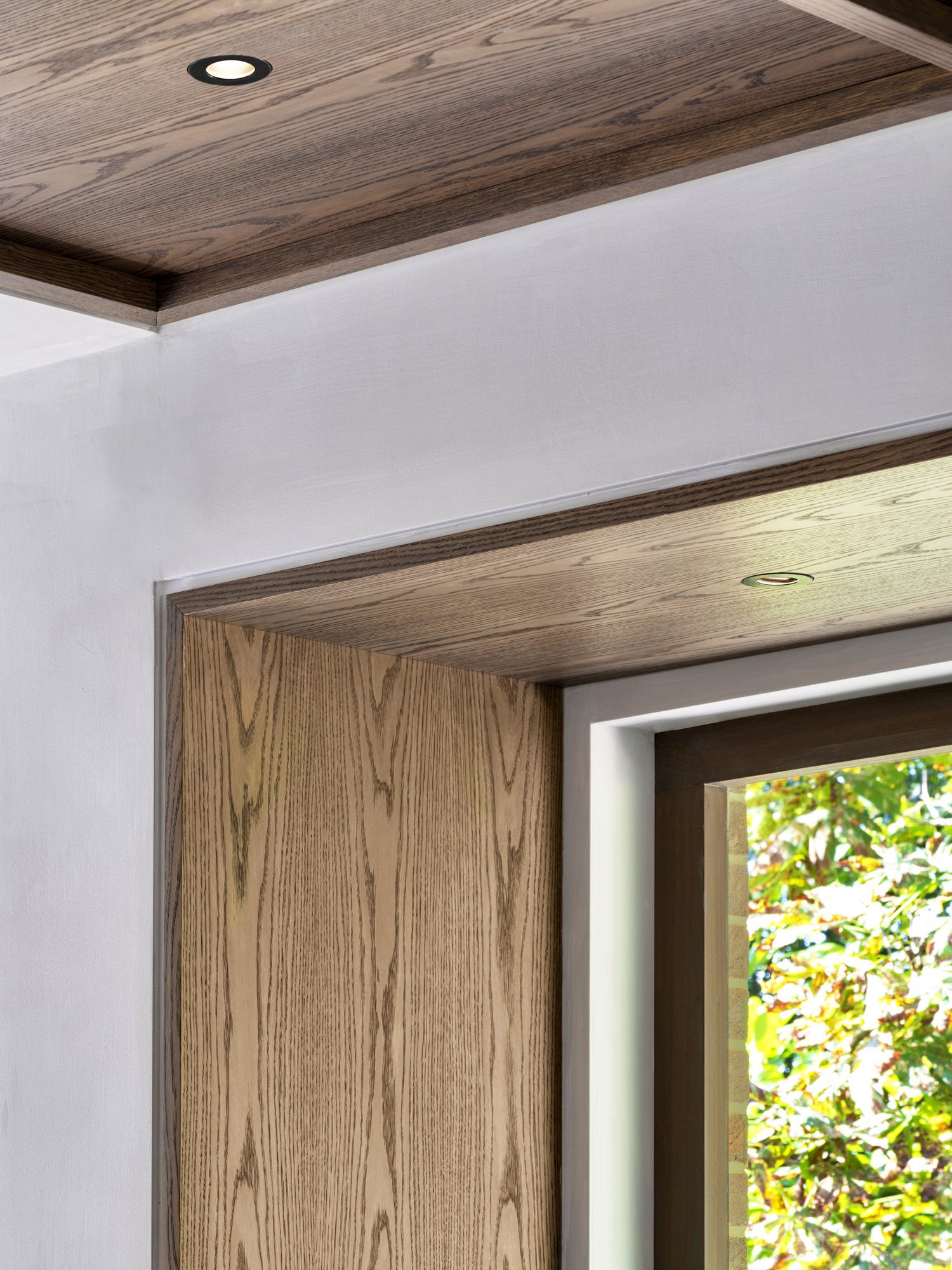 Highgate Minimal Modernism - LLI Design - Living room - dark timber veneer window soffit and ceiling detail