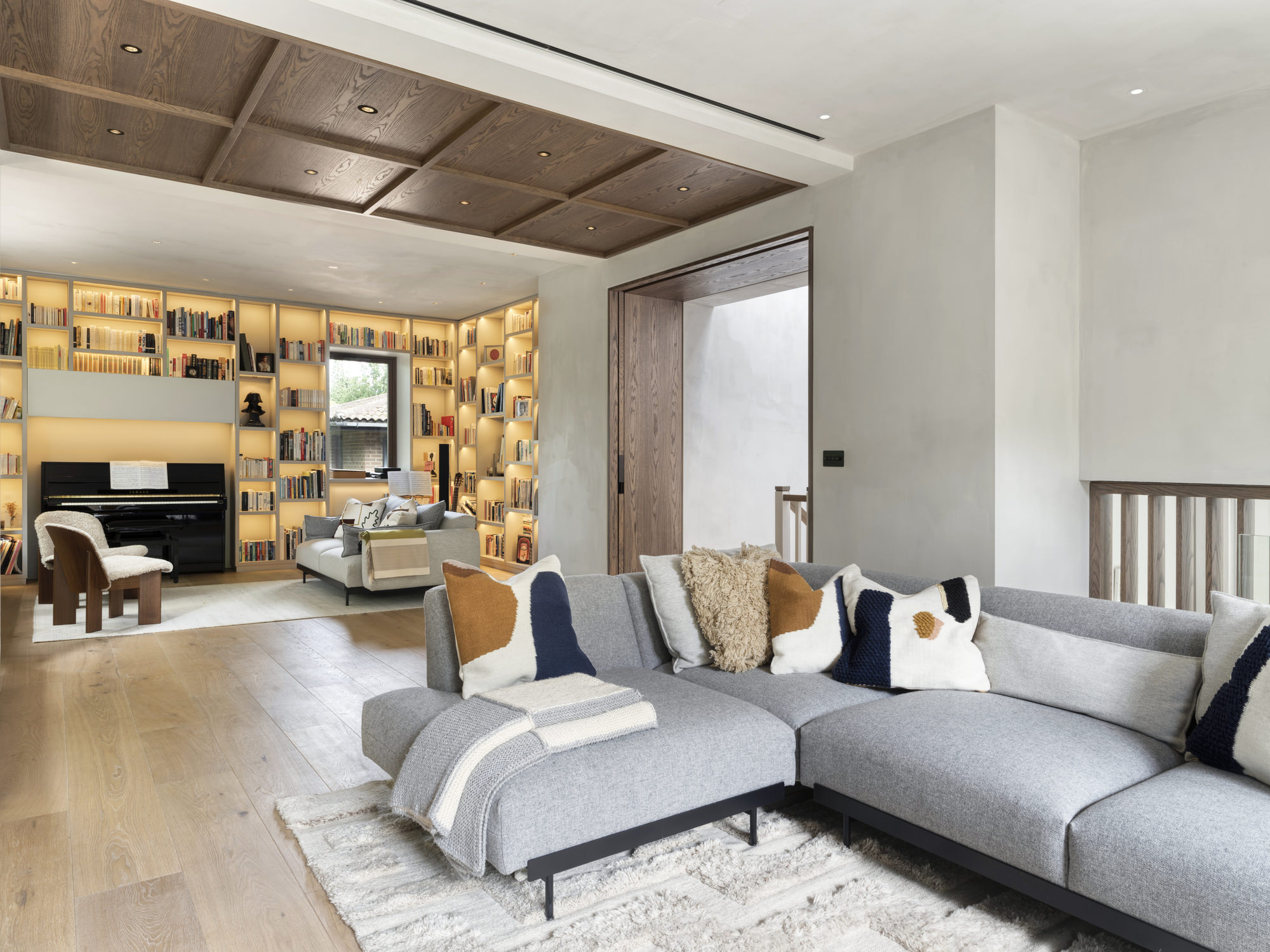 Highgate Minimal Modernism - LLI Design - Living room overview - with contemporary coffered ceiling detail bespoke joinery and sofa